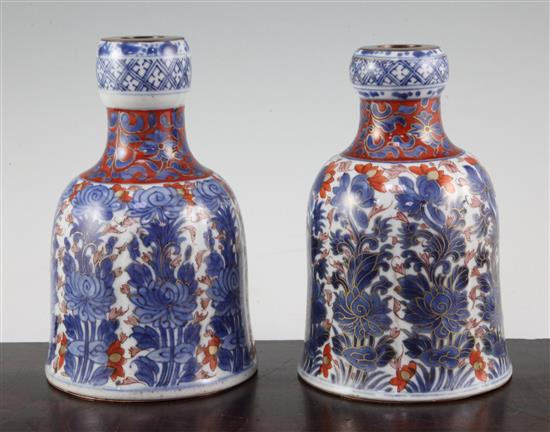 Two Chinese underglaze blue and iron red enamelled bell shaped huqqa bases, Kangxi period, 18cm. and 18.5cm.